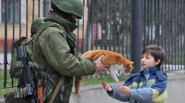 Soldier, child and cat